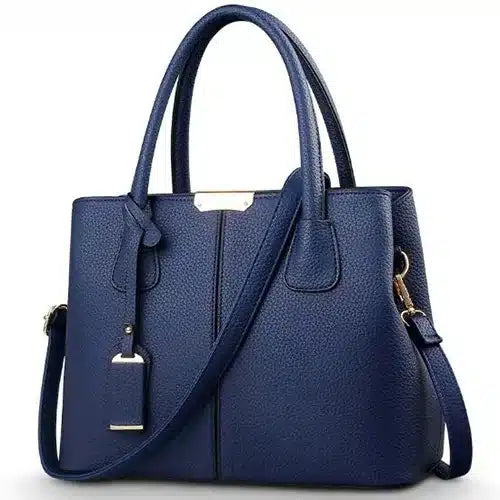 sac bandoulière carré en cuir synthétique Blå sur fond Vit
