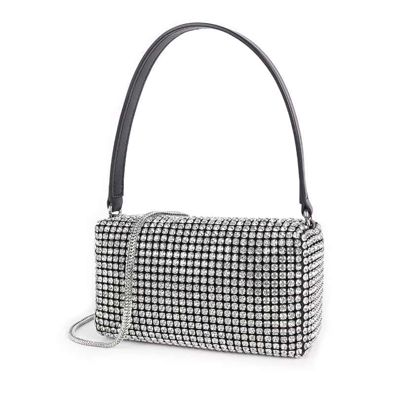 sac bandoulière en cuir et strass sur fond Vit