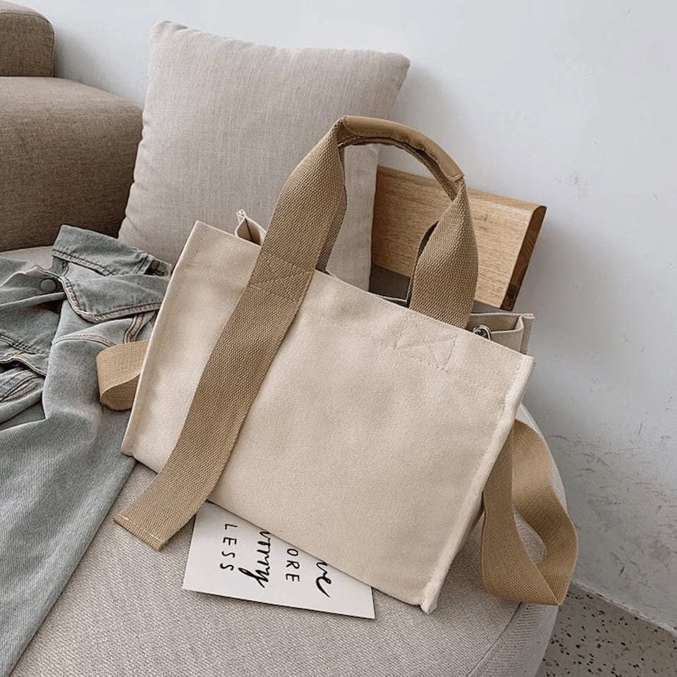 Beige canvas axelväska