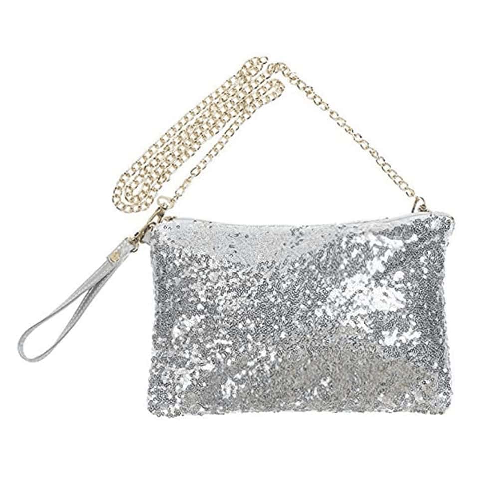 Photo d'un sac à paillette argent avec une bandoulière en chaine doré