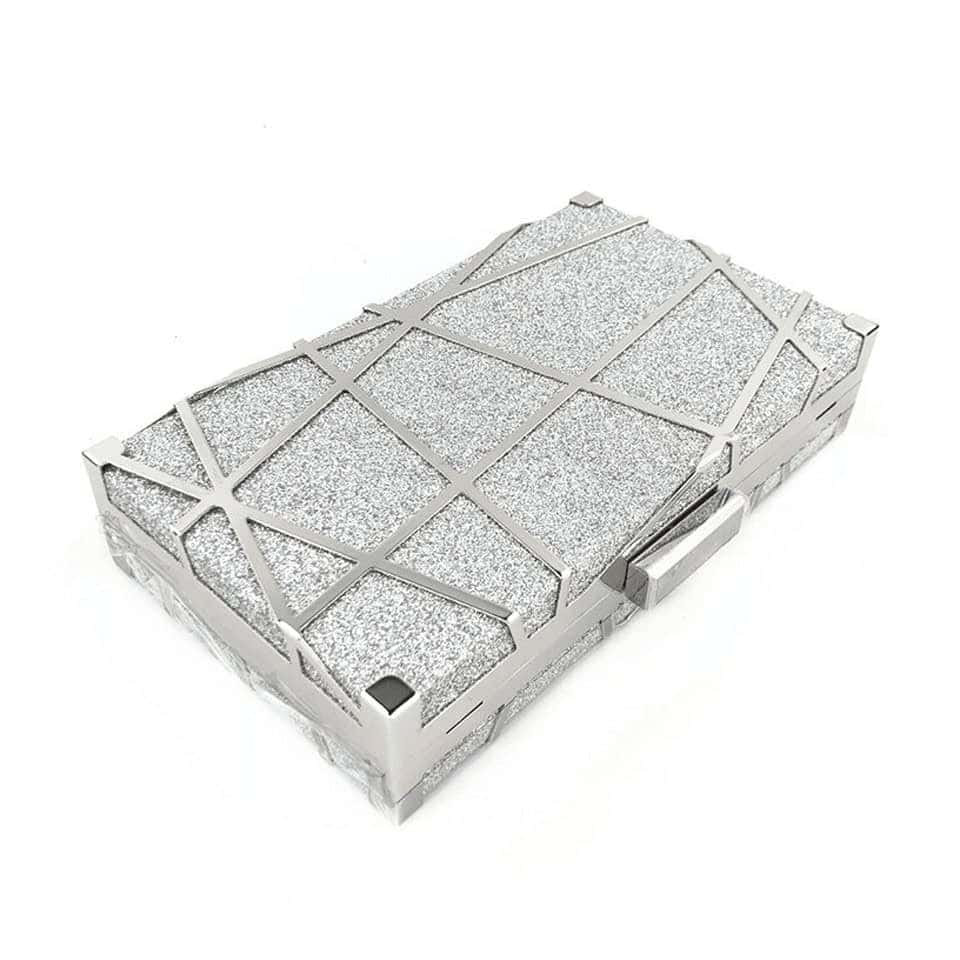 Grafisk silverglittrande axelväska