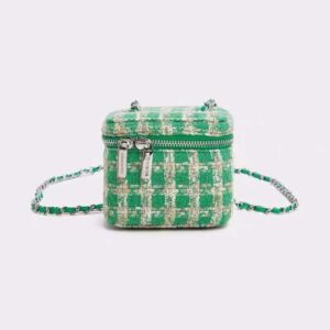Photo d'un sac en tweed Grön avec une bandoulière en chaine dorée.