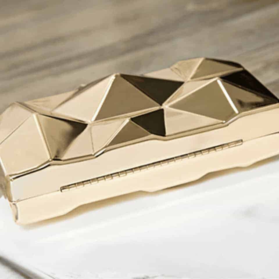 Guld geometrisk axelväska
