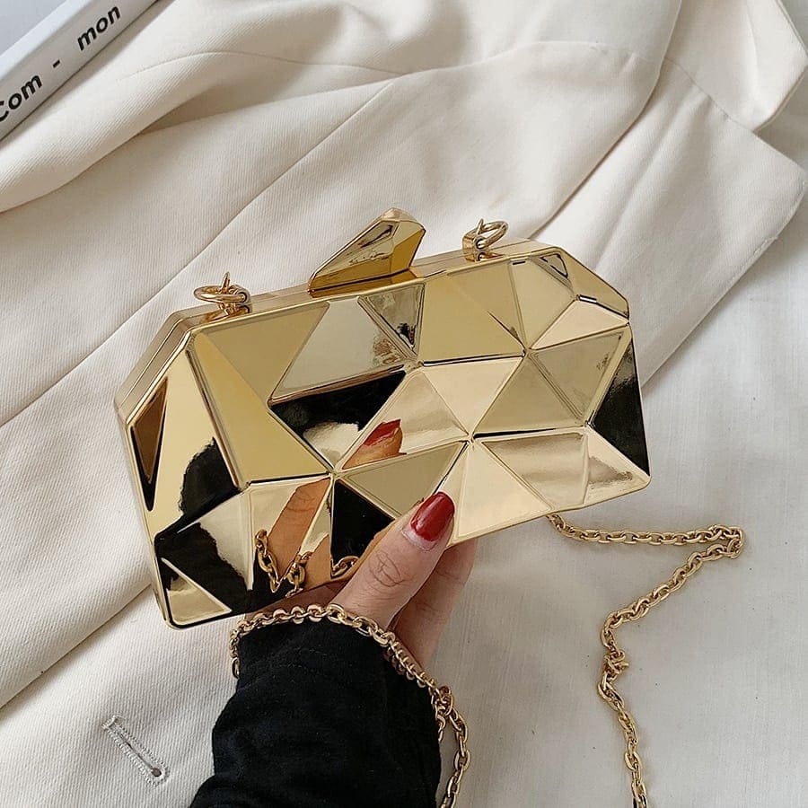 Guld geometrisk axelväska