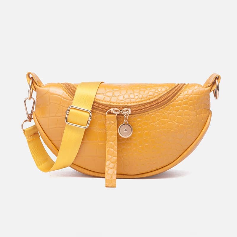 sac bandoulière banane Gul en cuir synthétique effet crocodile sur fond Vit