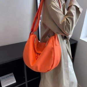 Orange axelväska i canvas för kvinnor