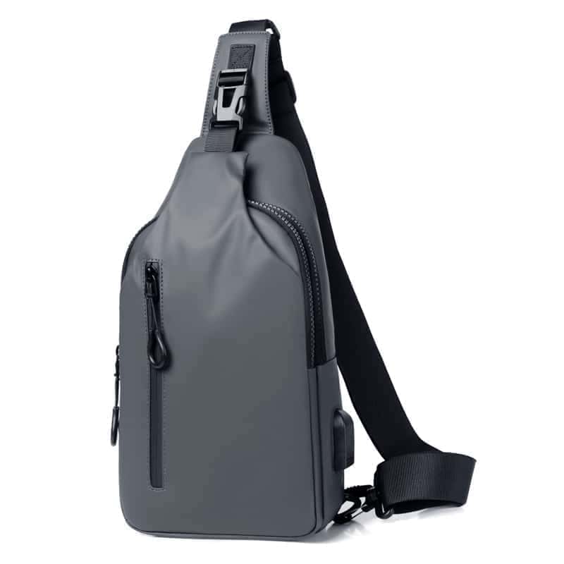 sac bandoulière poitrine ou dos gris sur fond Vit