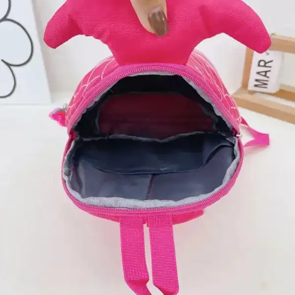 Barnryggsäck sjöjungfru rosa med fiskhuvud och öppen ficka.