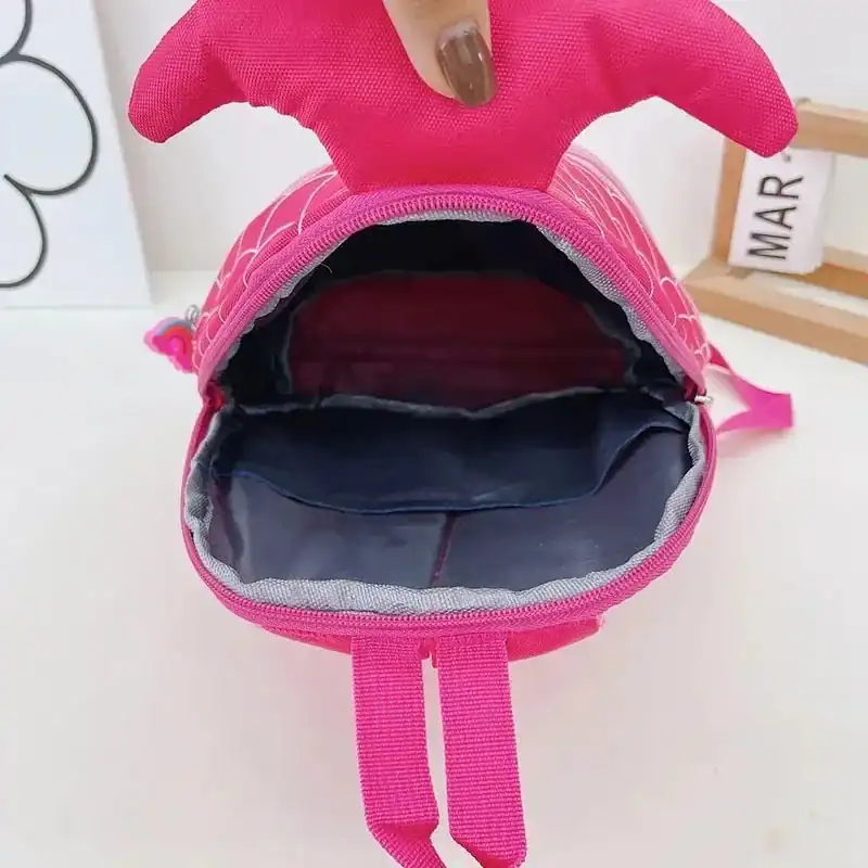 Barnryggsäck sjöjungfru rosa med fiskhuvud och öppen ficka.