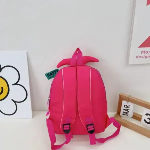 Barnryggsäck sjöjungfru rosa med horn och reflexband.