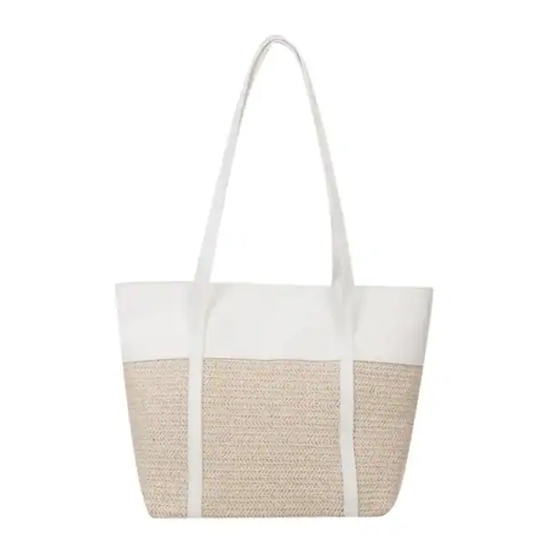 Brun beige flätad shoppingväska med vit topp och handtag.