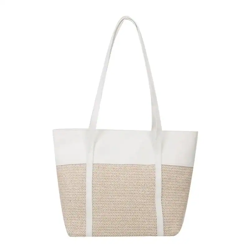 Brun beige flätad shoppingväska med vit topp och handtag.