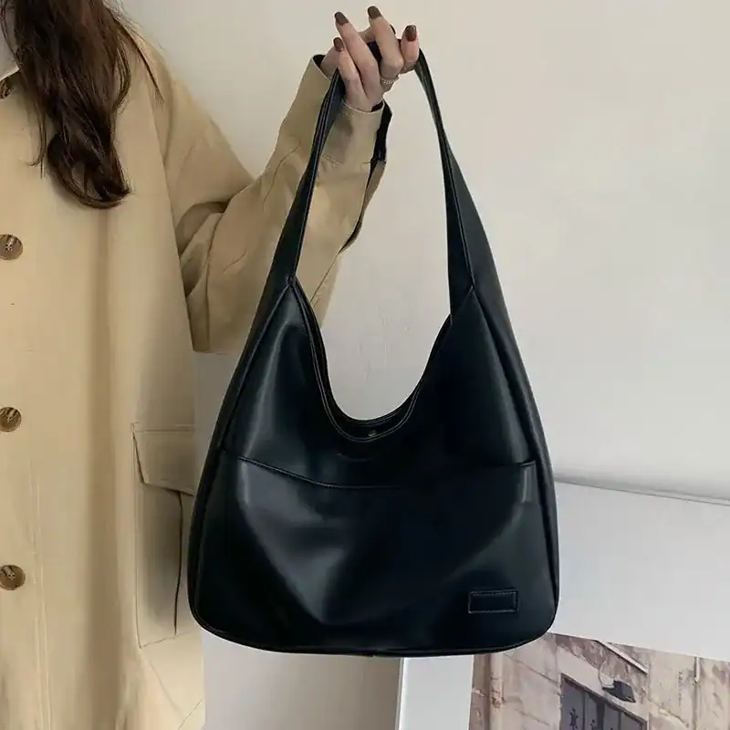 Brun hobo shoppingväska, stilfull och praktisk axelväska för daglig användning.