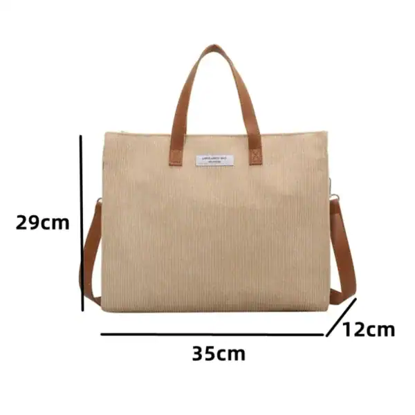 Brun Manchester shoppingväska med axelrem, 35x29x12 cm, läderhandtag.