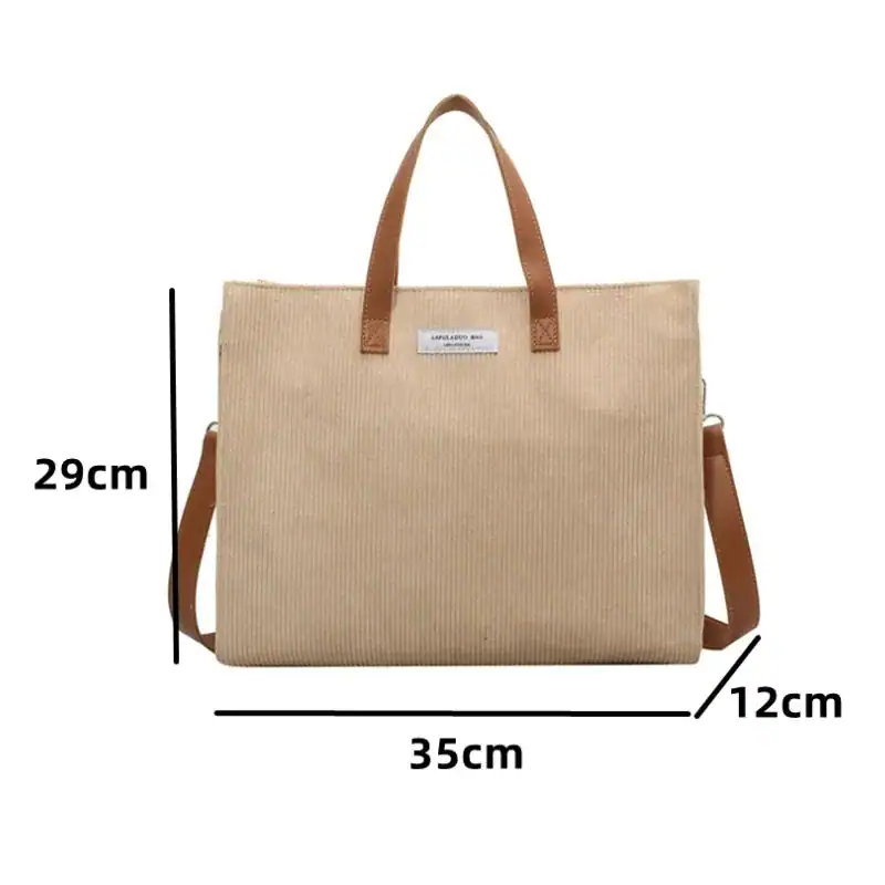 Brun Manchester shoppingväska med axelrem, 35x29x12 cm, läderhandtag.