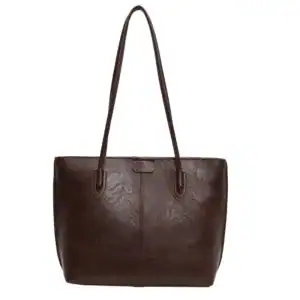Brun shopper väska i läder med texturerat yta och långt handtag.