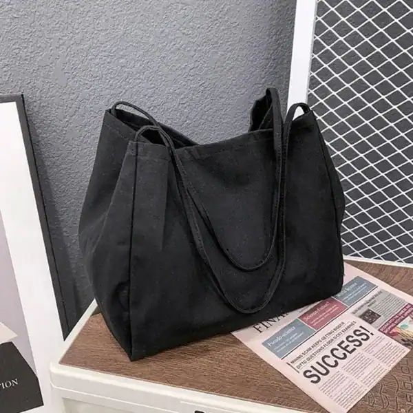 Brun tygshopper, stor handväska i bomull, trendig axelväska för vardag och shopping.