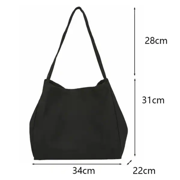 Brun tygshopper med mått 34x22x31 cm, ideal för vardaglig användning.