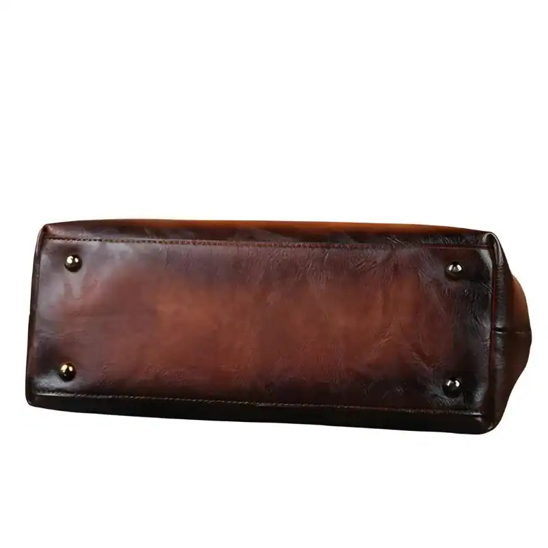 Brun Axelväska med präglat mönster, läder, handväska, vintage stil.