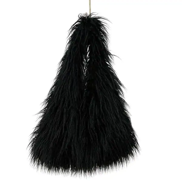 Svart fluffig väska med lång päls, perfekt för trendig inredning och som present.