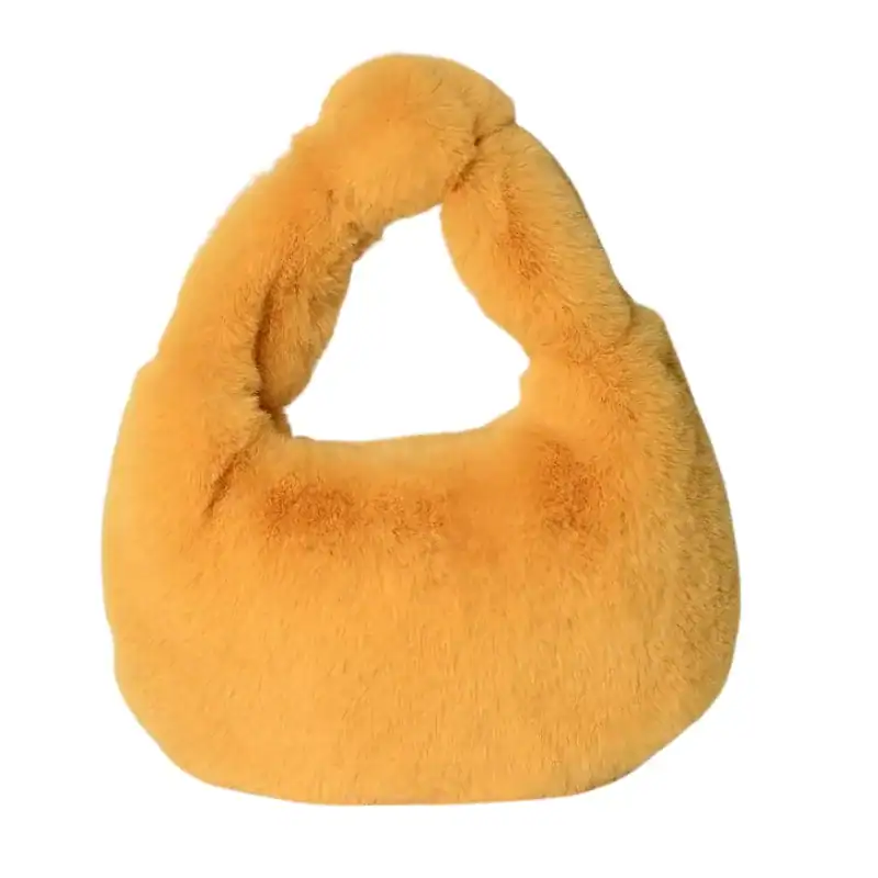 Grå fluffig hobo axelväska med mjuk pälsliknande yta och runt handtag.