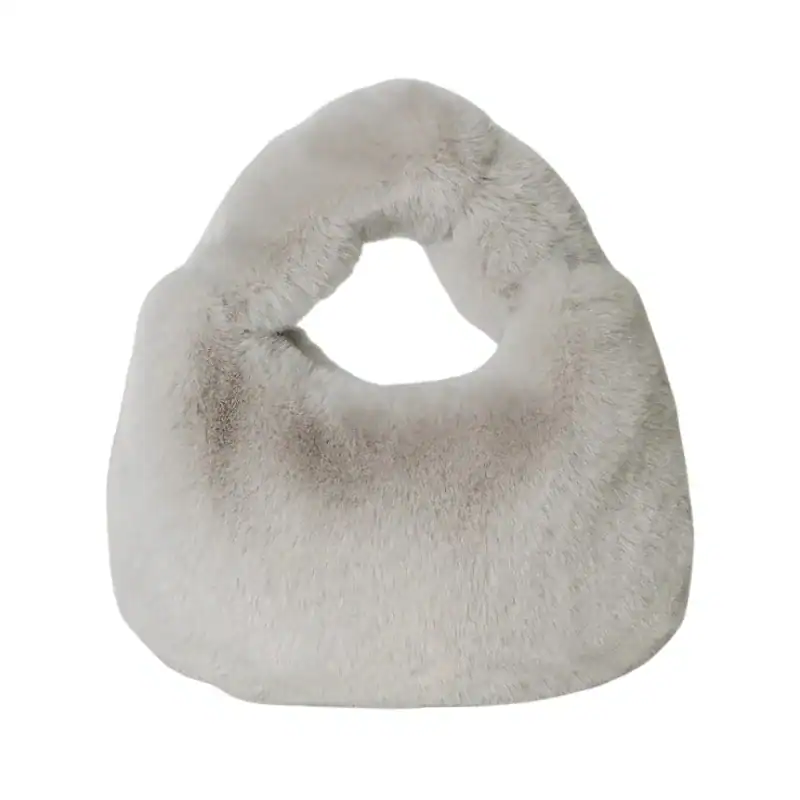 Grå fluffig hobo axelväska med runt handtag och mjuk pälsliknande yta.