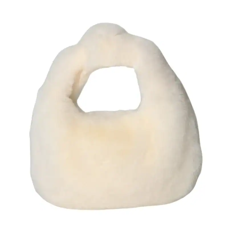 Grå fluffig hobo axelväska med runt handtag.
