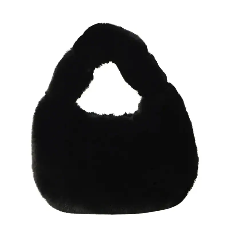 Grå fluffig hobo axelväska med runt handtag och mjuk pälsliknande yta.