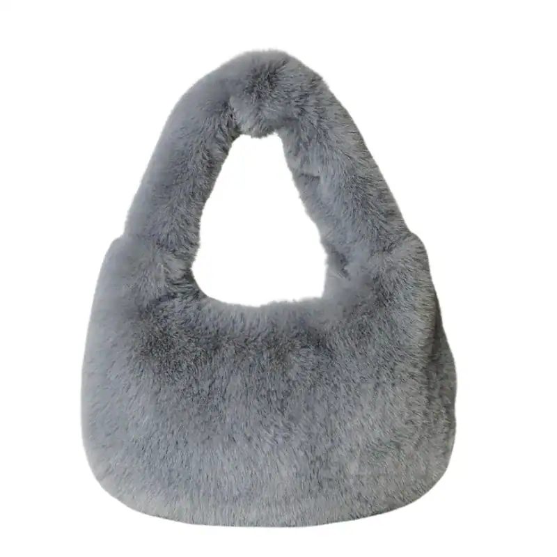 Grå fluffig hobo axelväska med mjuk pälsliknande yta och rund form.