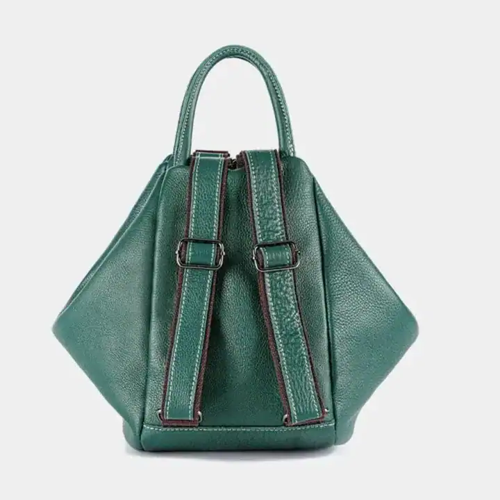Grön ryggsäck Axelväska, praktisk väska med handtag och axelremmar.