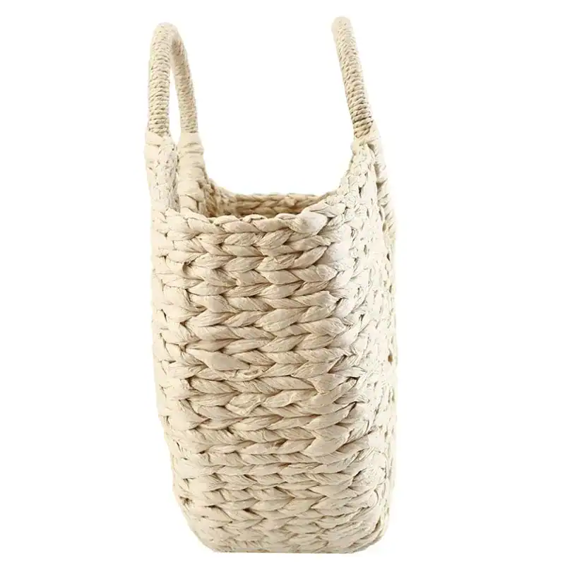 Halvmånsformad stråväska i naturfärg, handgjord med raffia och runt handtag.