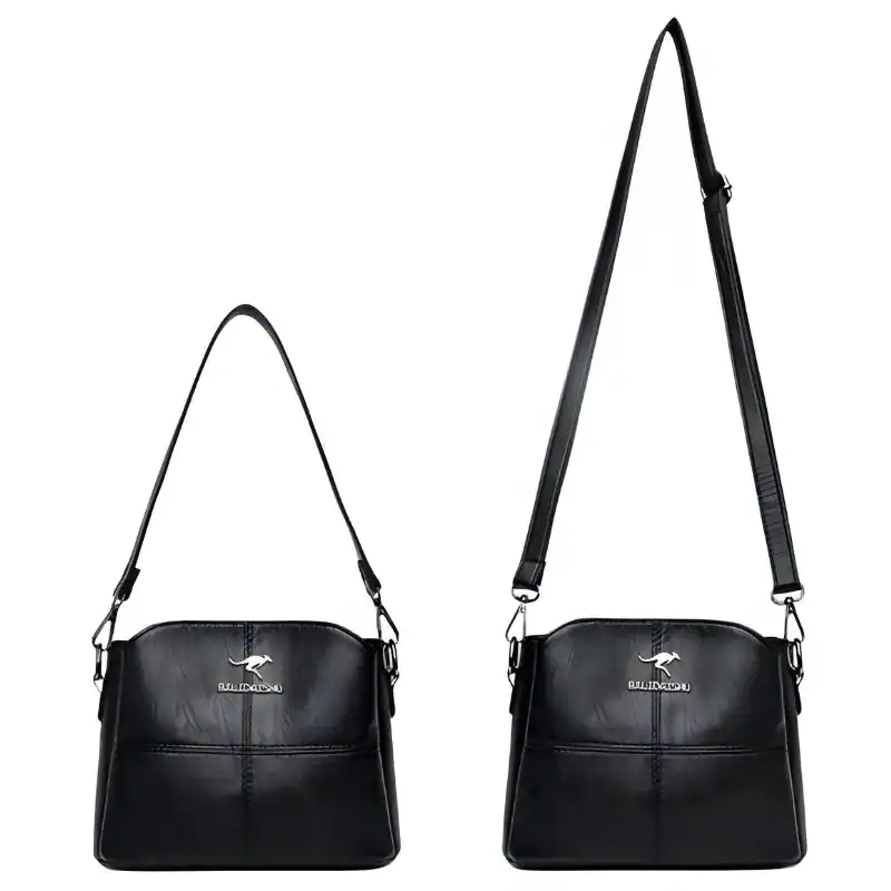 Krämvit crossbody väska, svart läder, Axelväska logo, axelväska damväskor.