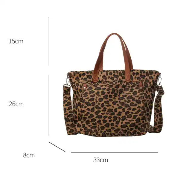 Leopard mönster axelväska med handtag och axelrem, storlek 33x26x15 cm.