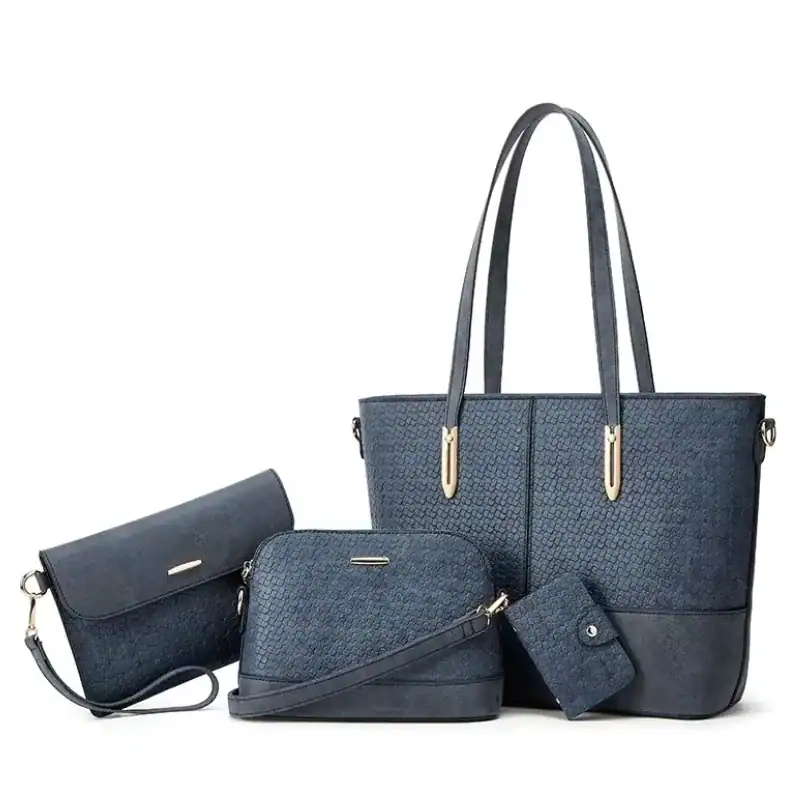 Mintgrön väskset med stor handväska, axelväska, plånbok och miniväska.