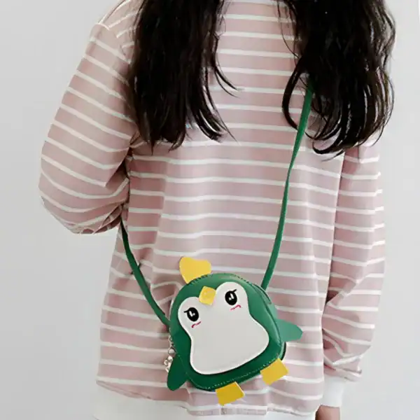 Rosa fågelväska barn med pinguinmotiv, axelväska för små barn.