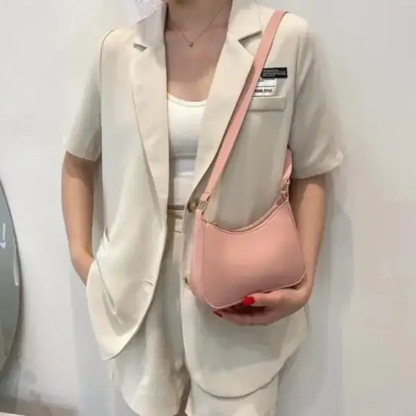 Rosa liten axelväska i läder, modeaccessoarer för kvinnor.