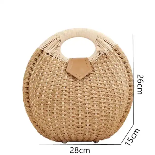 Rund rotingväska i naturfärgad rödrot, med handtag och mått 28x26x15 cm.