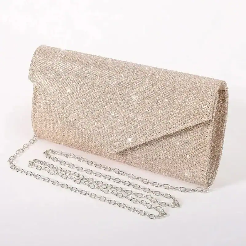 Silver glitter clutch med kedja, elegant klänningstaske för fest och galakväll.