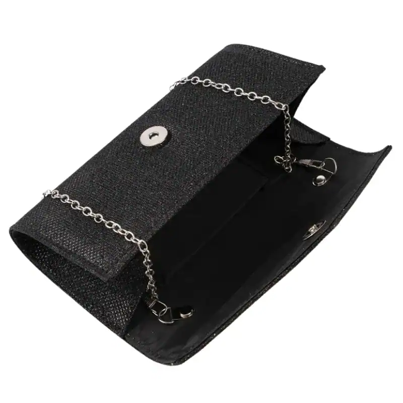Silver glitterclutch med kedja, svart axelväska med silverkedja och knapp.