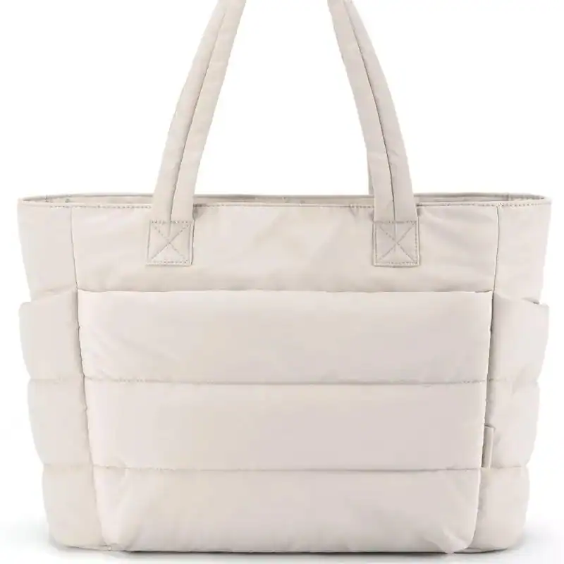 Svart datorväska med pufferad design och starka handtag.