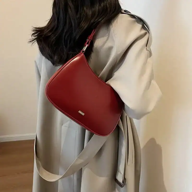 Svart halvmånsväska i läder, modeväskor för kvinnor, axelväska med elegant design.