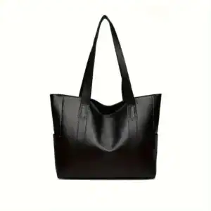 Svart tote bag med långt handtag och elegant design för vardag och stil.