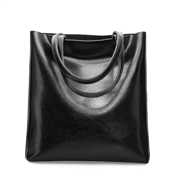 Vinröd tote bag i läder, stilren och praktisk axelväska för vardag.